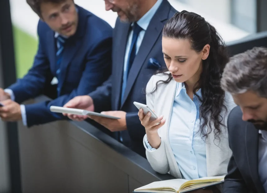 businesspeople-using-mobile-phone-digital-tablet